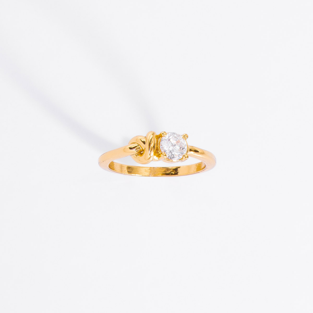 Anillo con piedra redonda y nudito