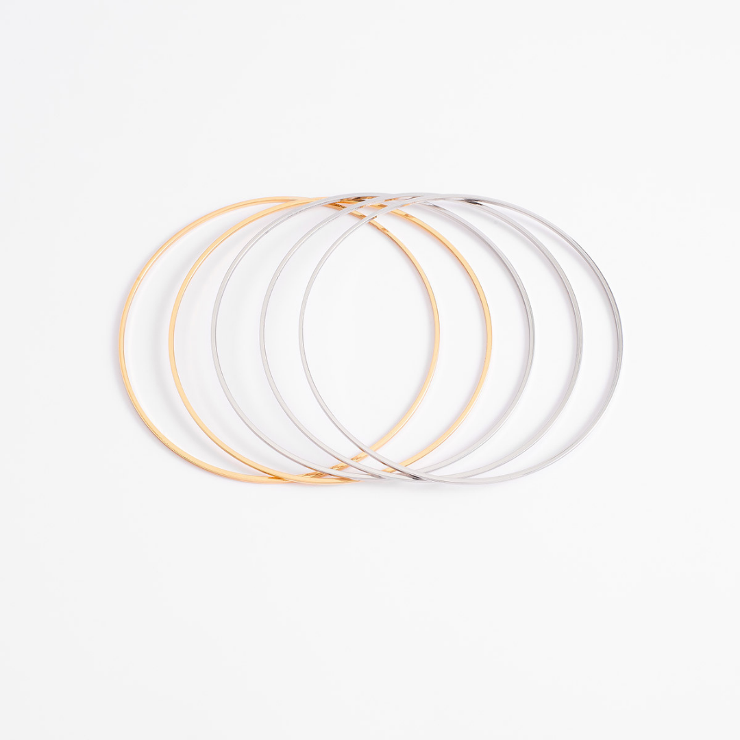 Set de pulseras delgadas en dos tonos
