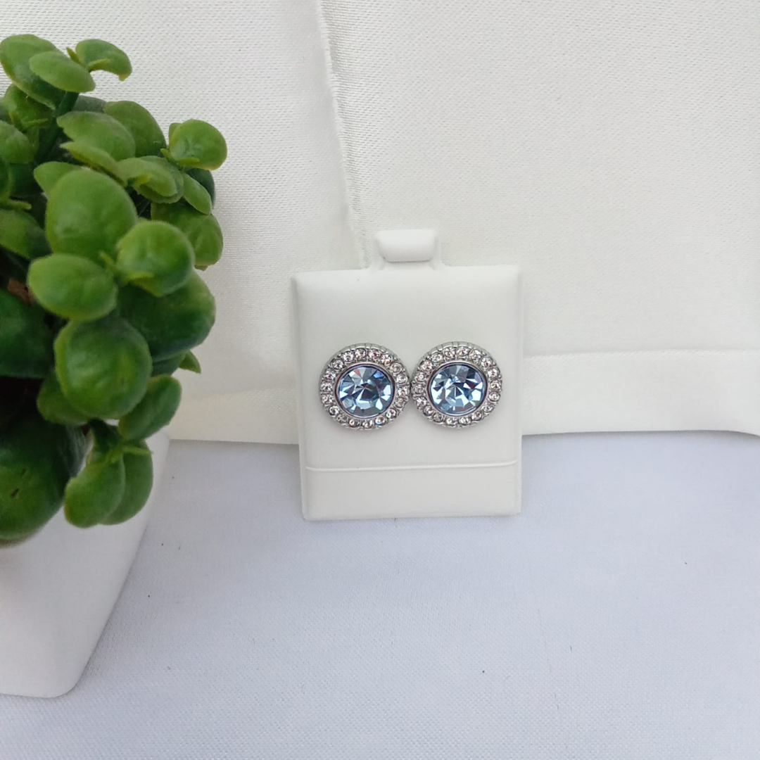 Aretes diamante azul rodeado de diamantes