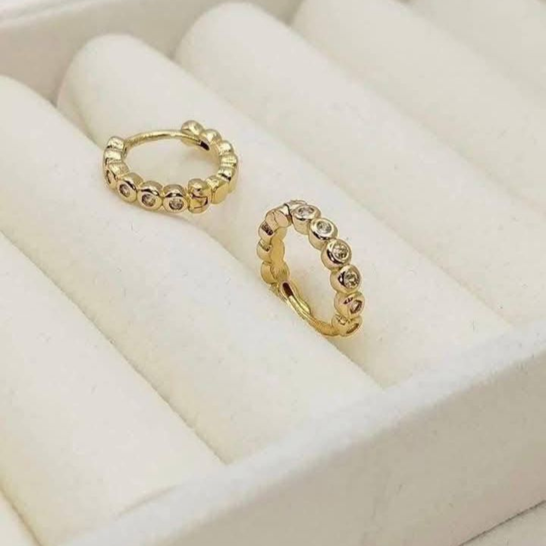 Arracadas en baño de oro con piedras cristal