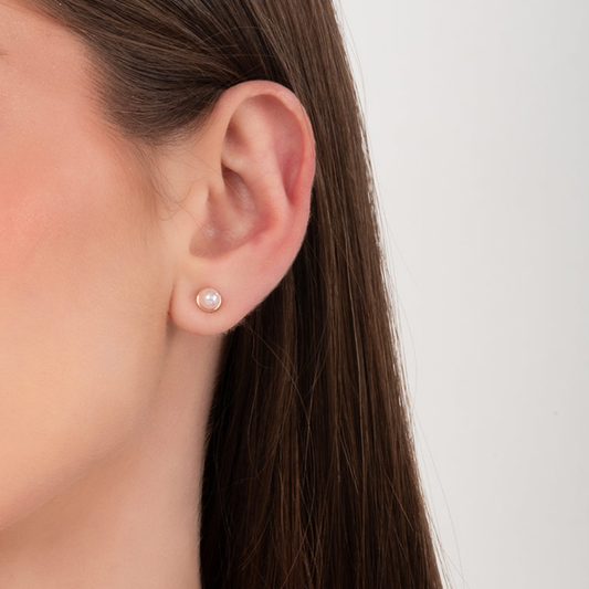 Aretes diseño perla tono rosa