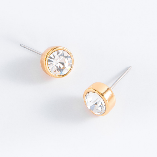 Aretes tipo broqueles con piedra tono cristal