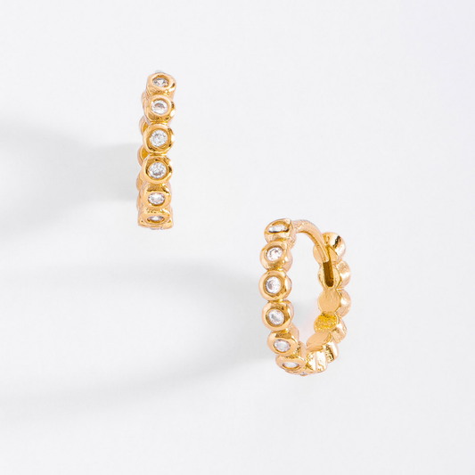 Arracadas en baño de oro con piedras cristal