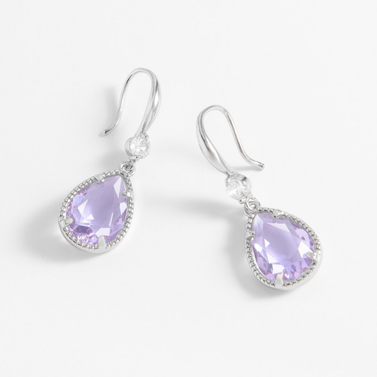 Aretes largos con piedras violetas