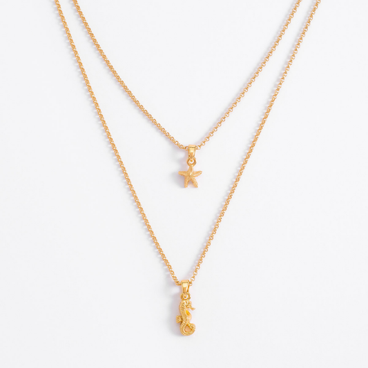 Collar doble cadena oro 18K estrella y caballito