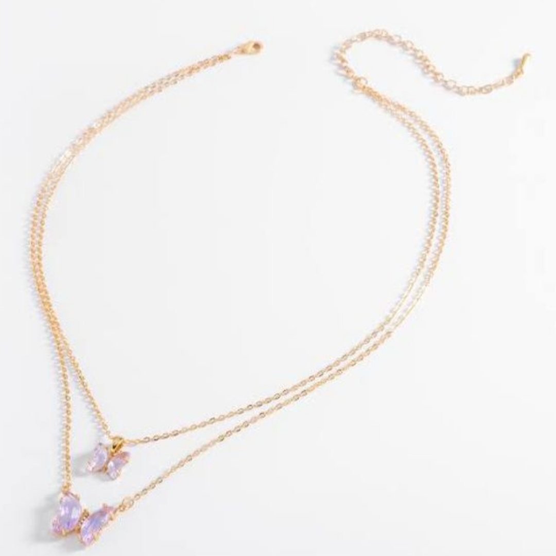 Collar doble baño oro con dijes mariposa lila