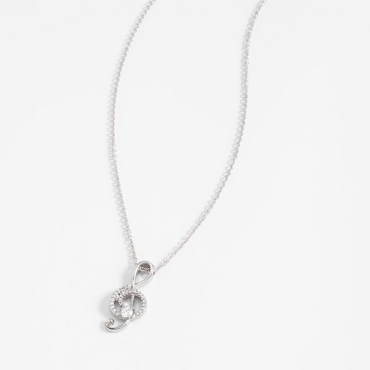 Collar en baño de platino con dije clave de sol y piedras