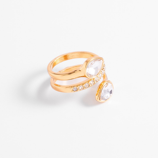 Anillo en espiral y piedras tono cristal