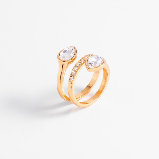 Anillo en espiral y piedras tono cristal