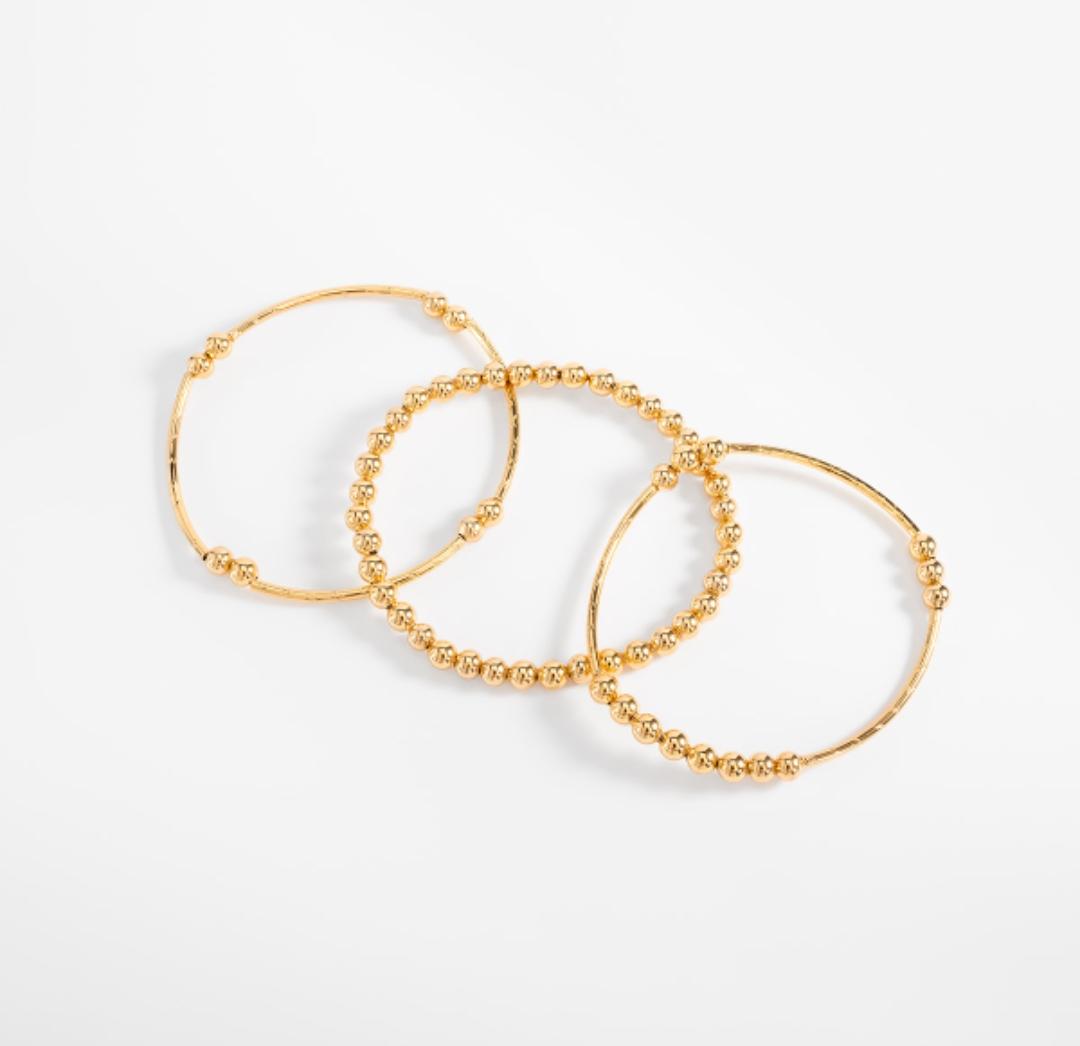 Trío de pulseras oro